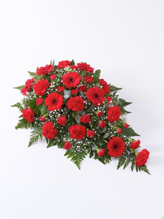 Hermoso arreglo en tonos rojos